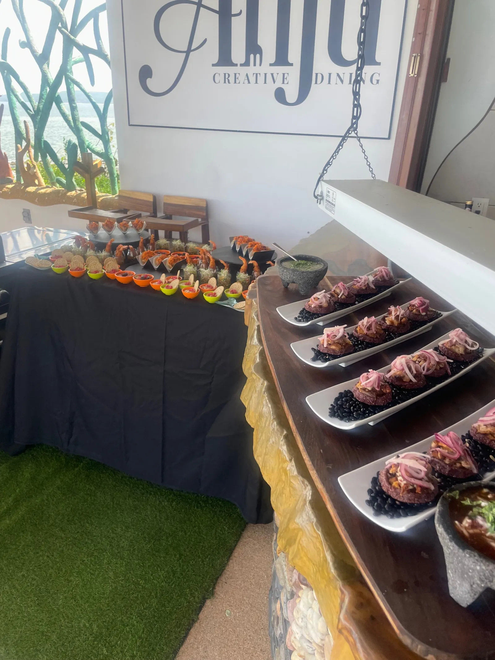 Anju Creative Dining branded table setup at La Puesta del Sol