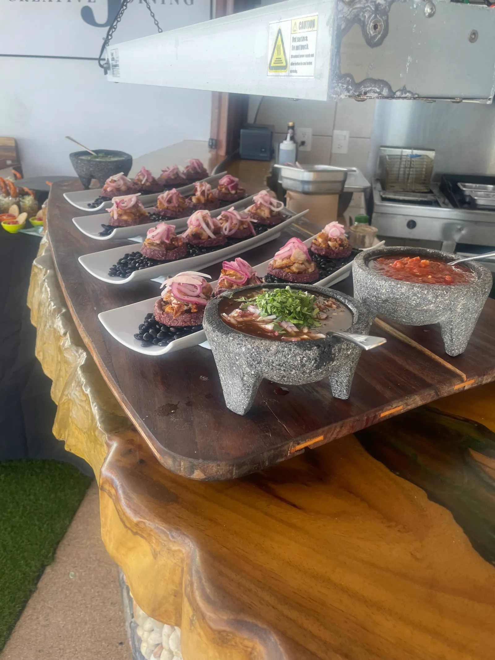 Artisan plated appetizers with stone molcajetes
